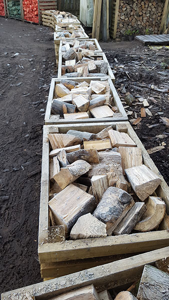 Boxes of hardwood logs for collection Nettlebed Sawmill